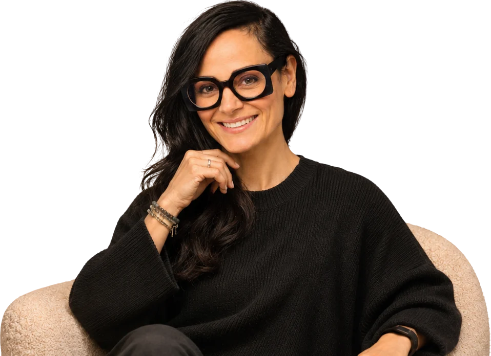 Silvija Akif, smiling, seated in an armchair